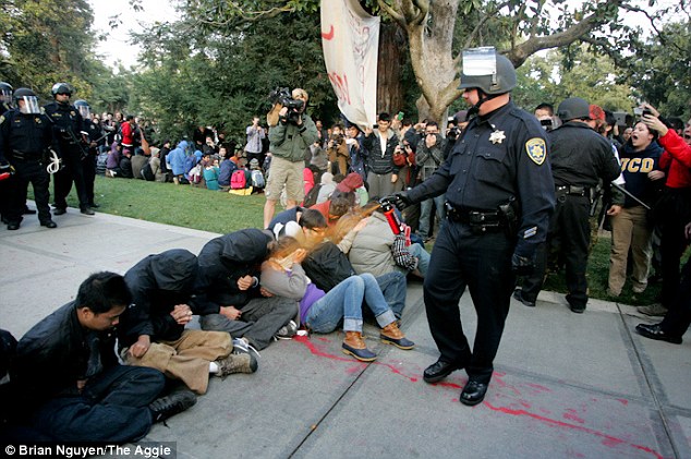 Pig Spraying Peaceful Demonstrators